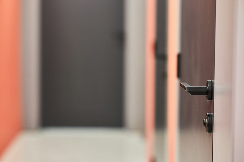 A real door lever and lock at an interior entrance.